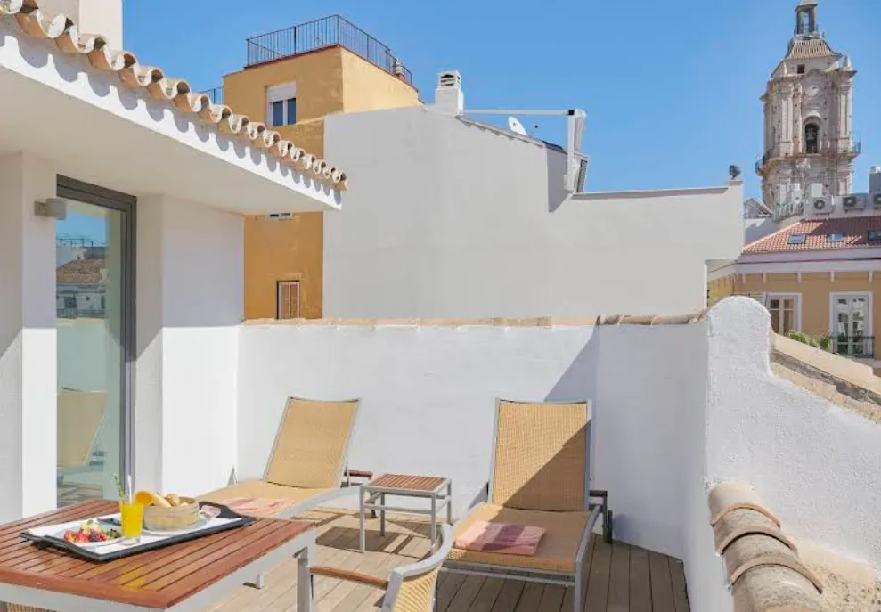 Vincci Seleccion Posada del Patio hotel with rooftop pool overlooking Malaga's Old Town