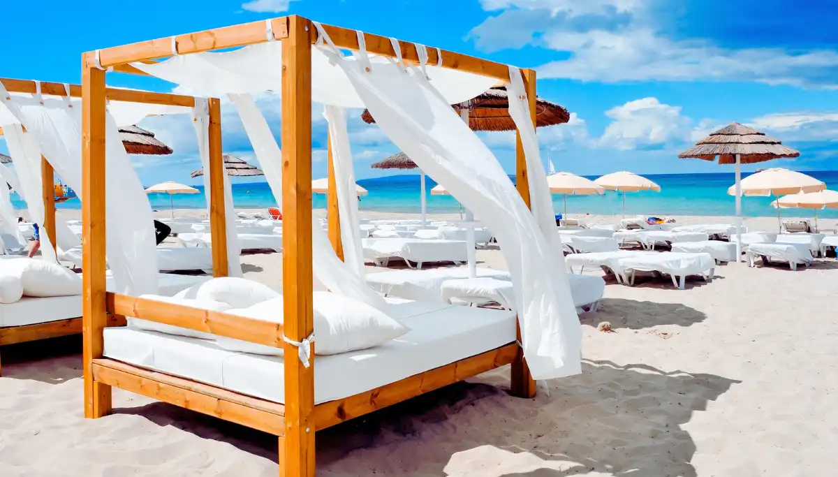 Sunbeds and parasols at a Marbella beach club
