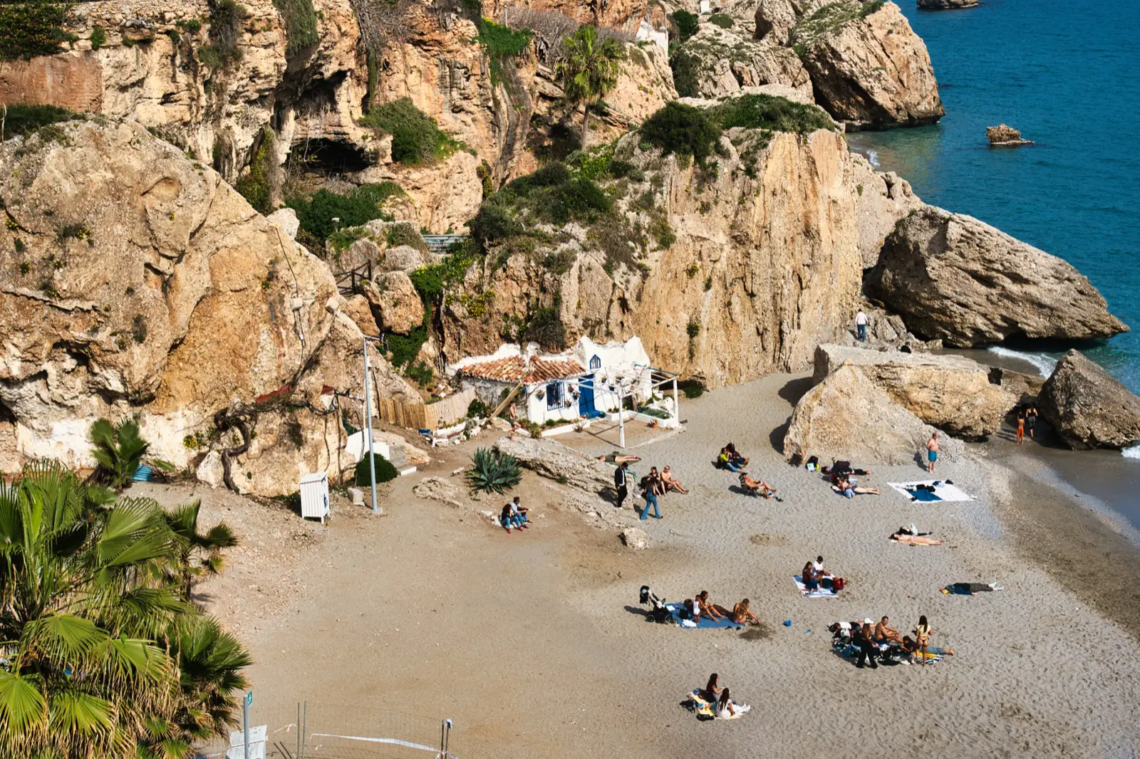 House built into the cliff at Nerja beach