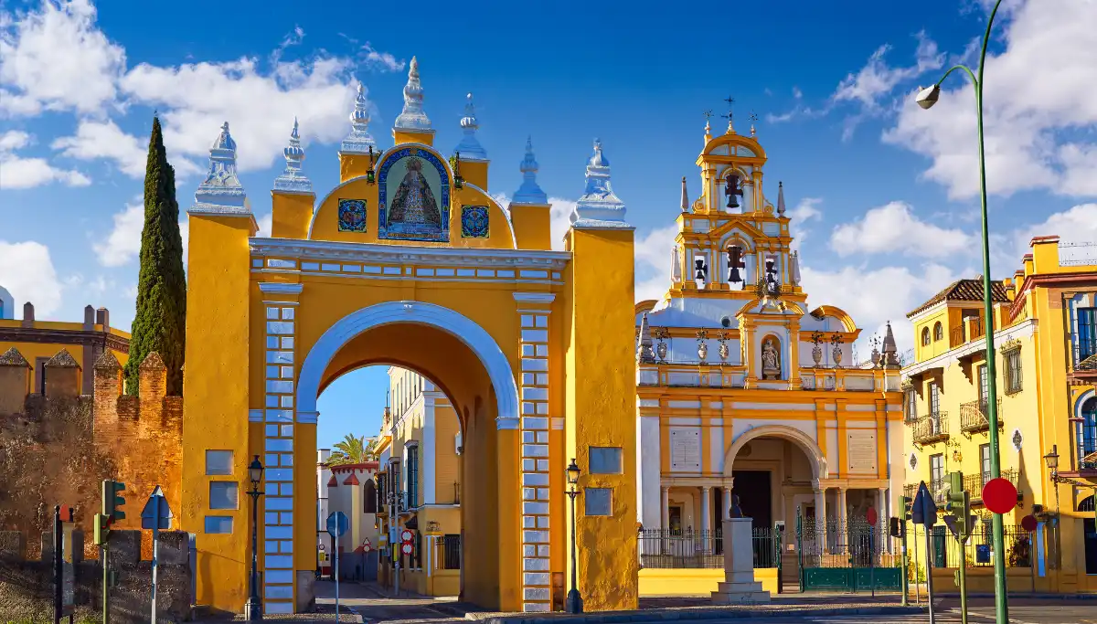 The yellow Macarena gate and basilica entrance in Seville