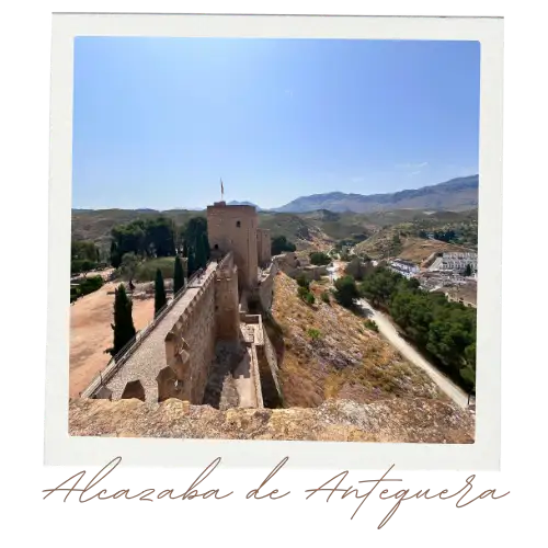The Alcazaba castle in Antquera with a blue sky background.