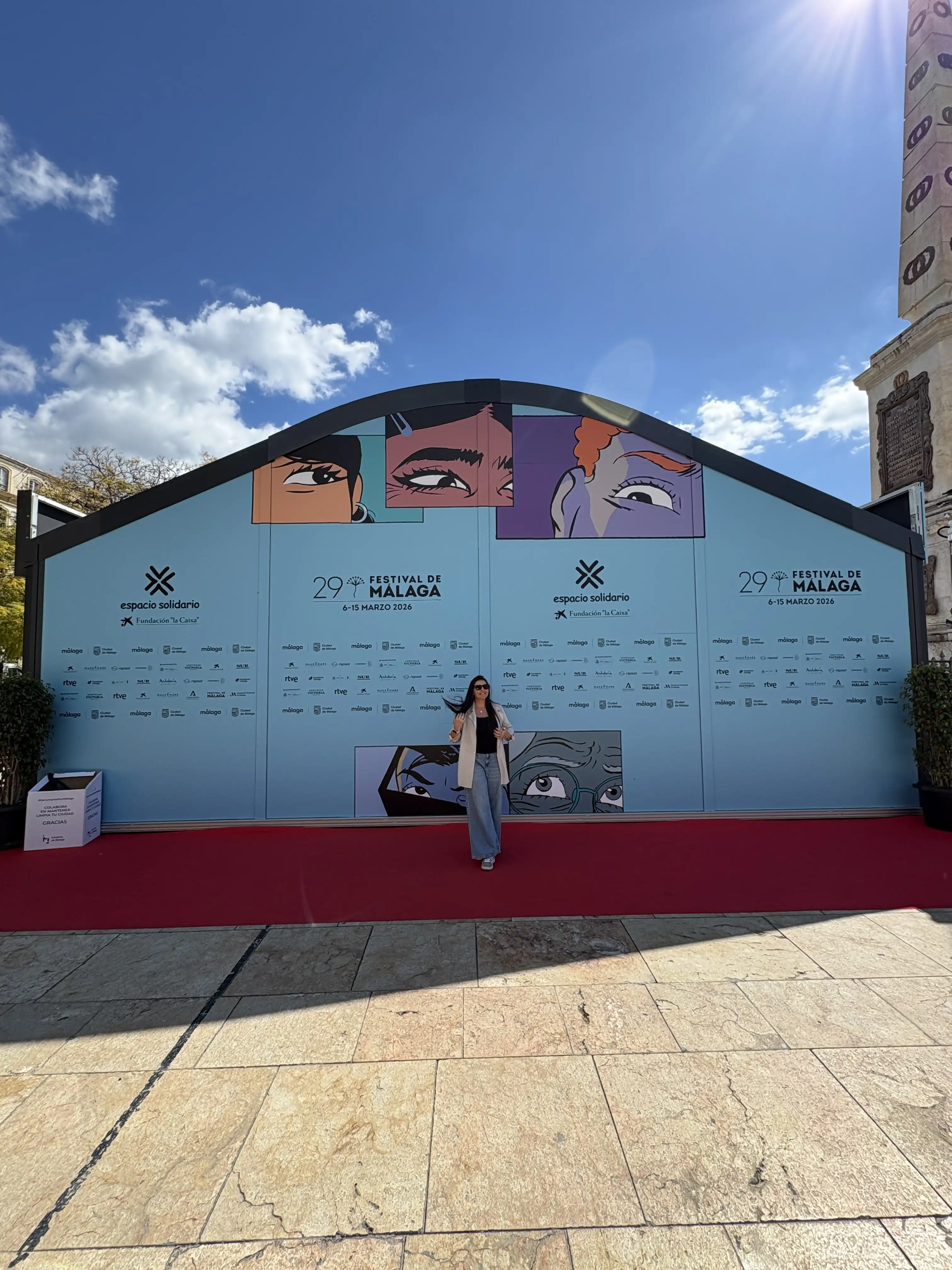 Heidi in front of a Malaga summer film festival backdrop