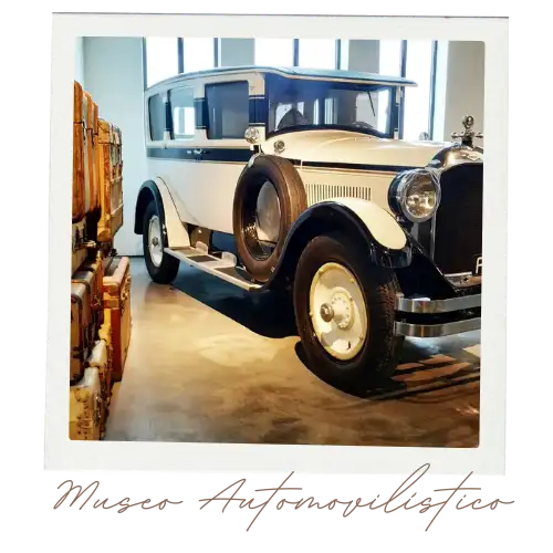 Vintage cars and designer fashion exhibits inside the Automobile and Fashion Museum Malaga