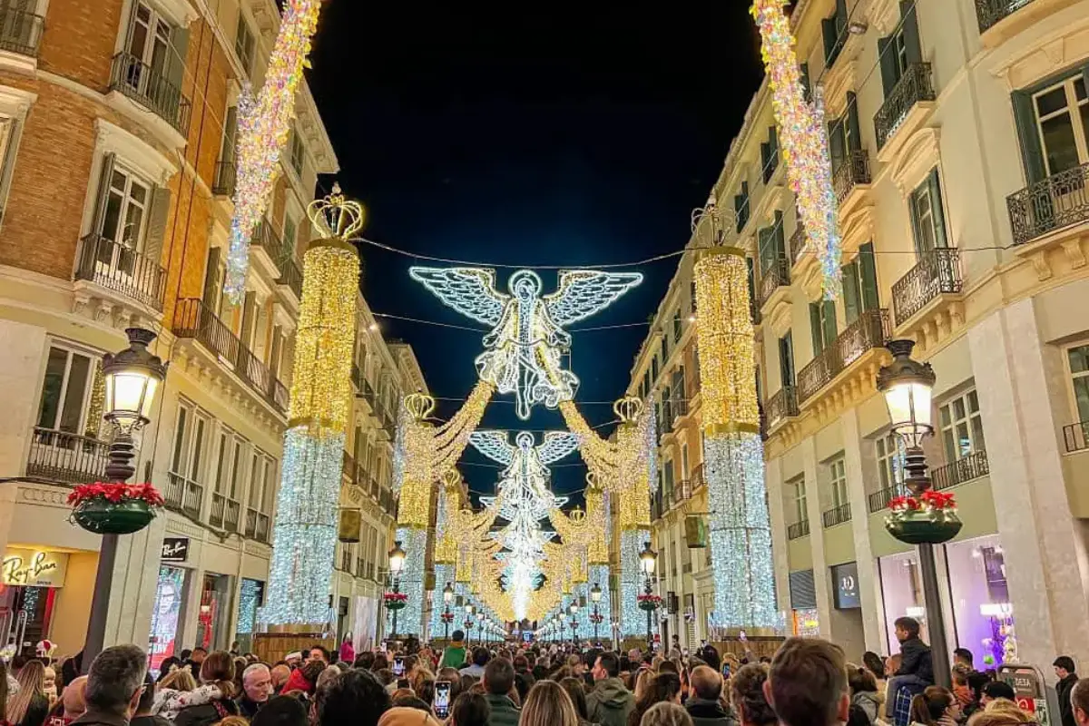 Golden angel Christmas lights stretching the length of Calle Larios in Malaga