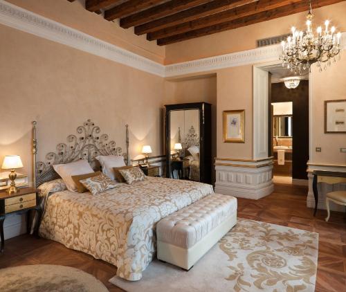 Restored 19th-century mansion facade of Hotel Casa 1800 in Seville's Santa Cruz quarter