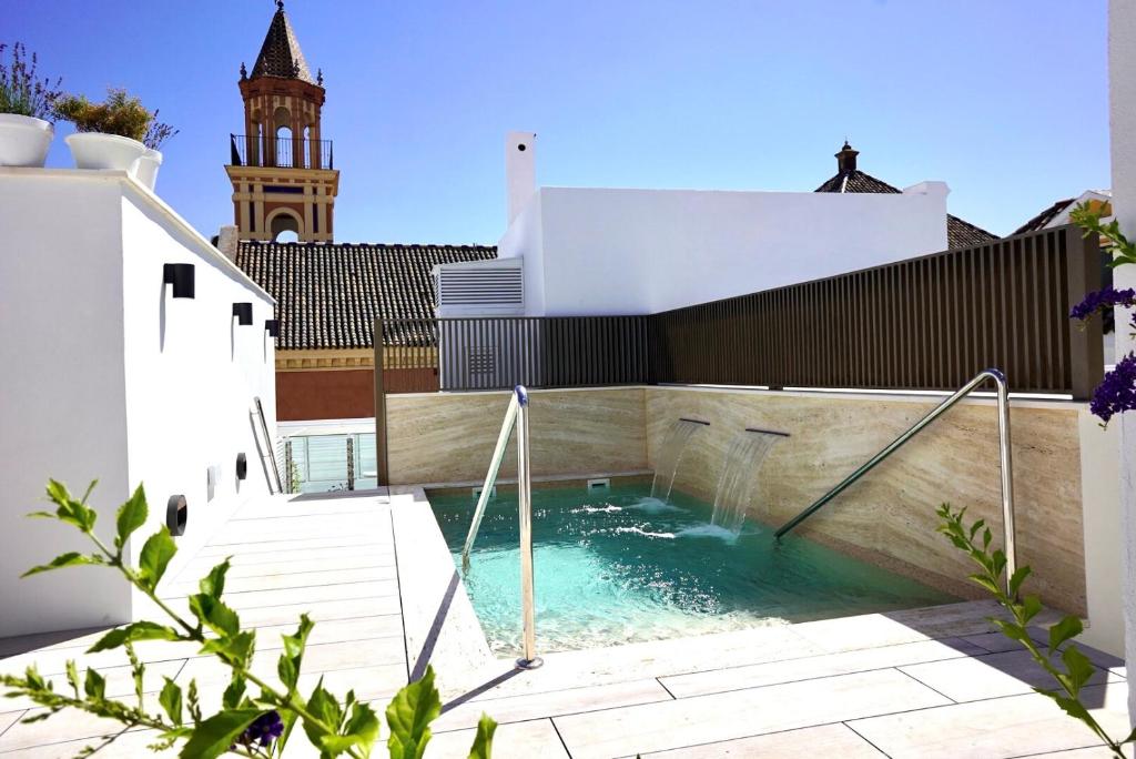 Music-themed room with soundproofed practice space at Hotel Amadeus Seville