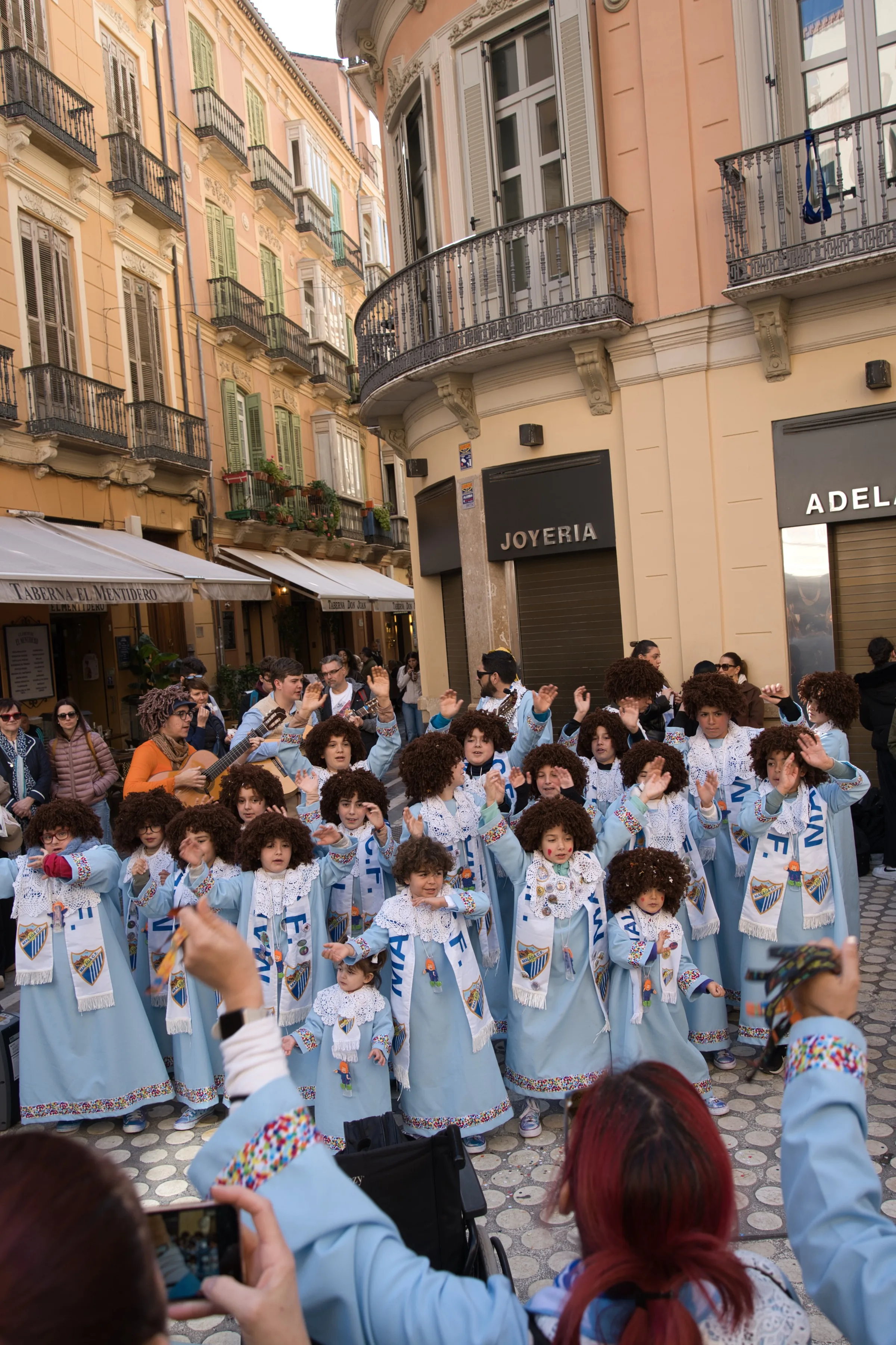Children singing at Malaga Carnival