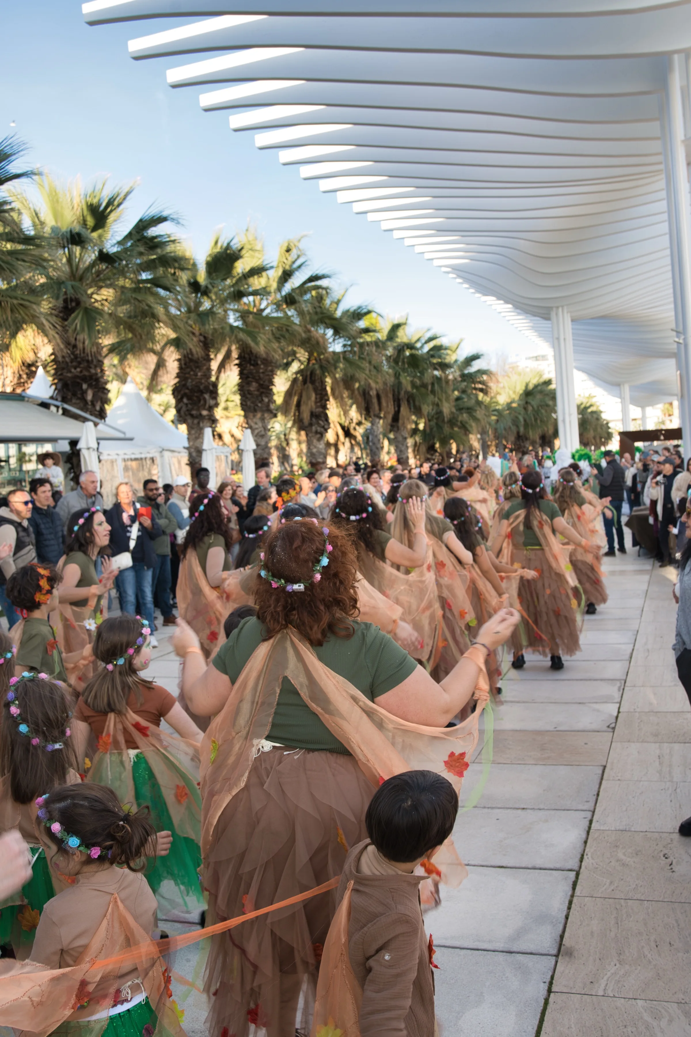 Women clapping hands at the Malaga Carnival