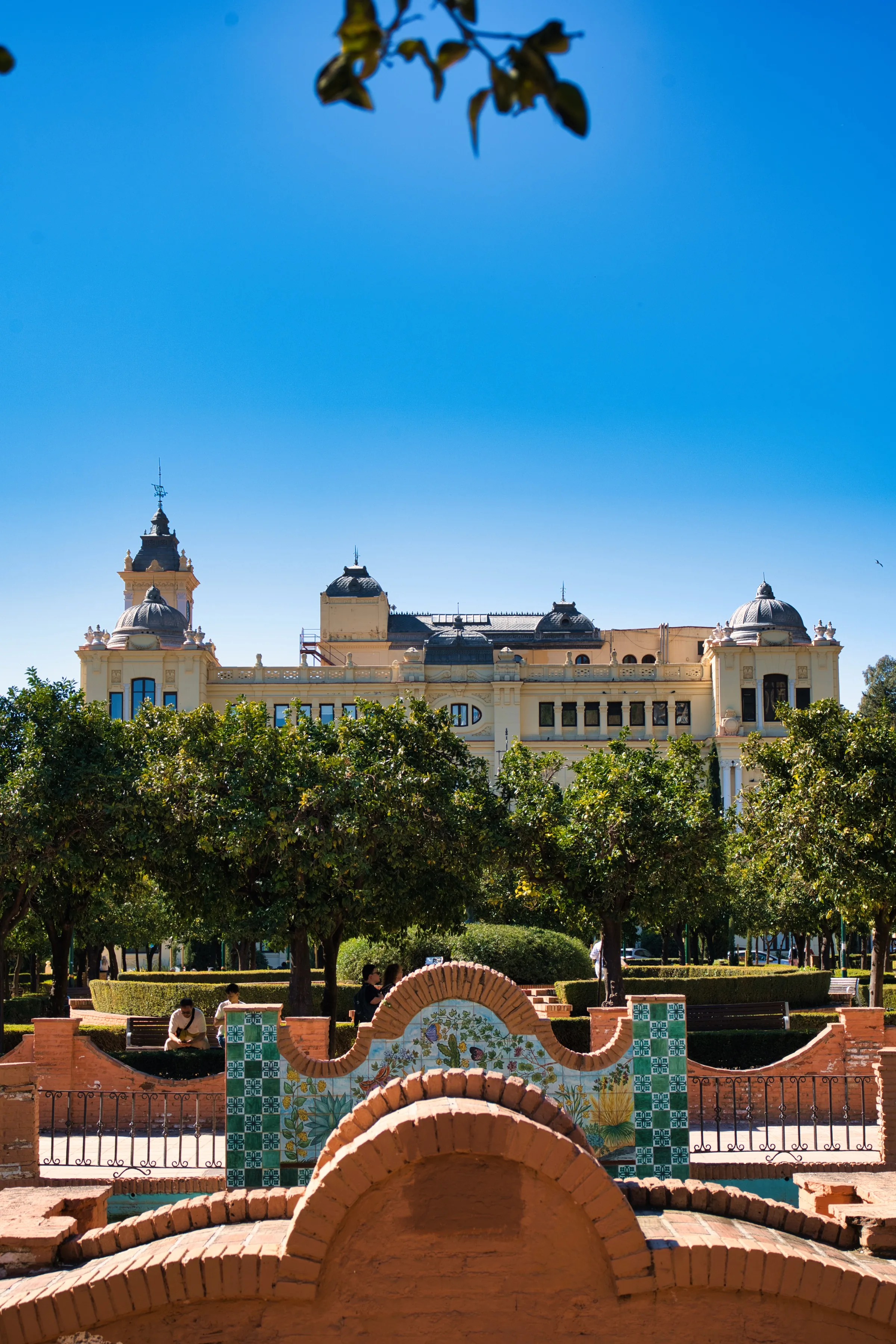 Gardens with view of Malaga architecture