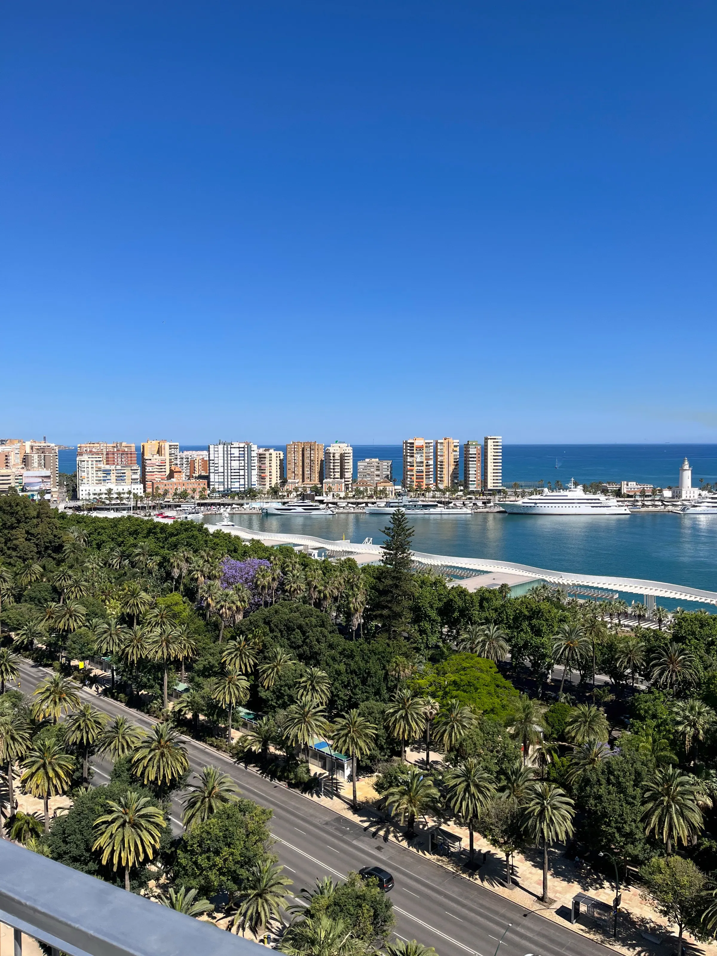 Malaga port rooftop view at sunset