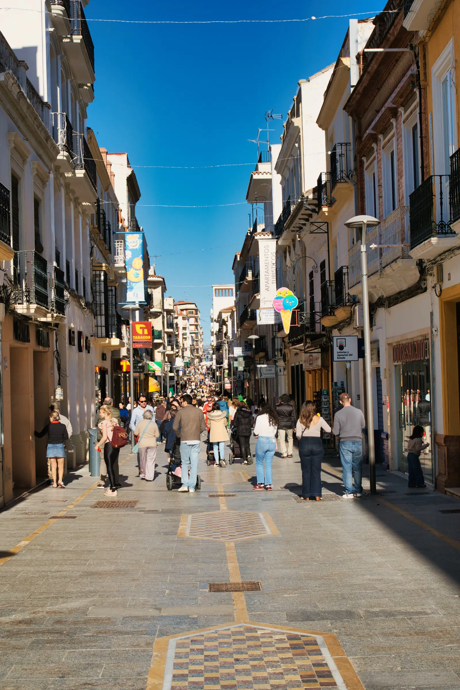 Shops and cafes on Ronda's main pedestrian street.