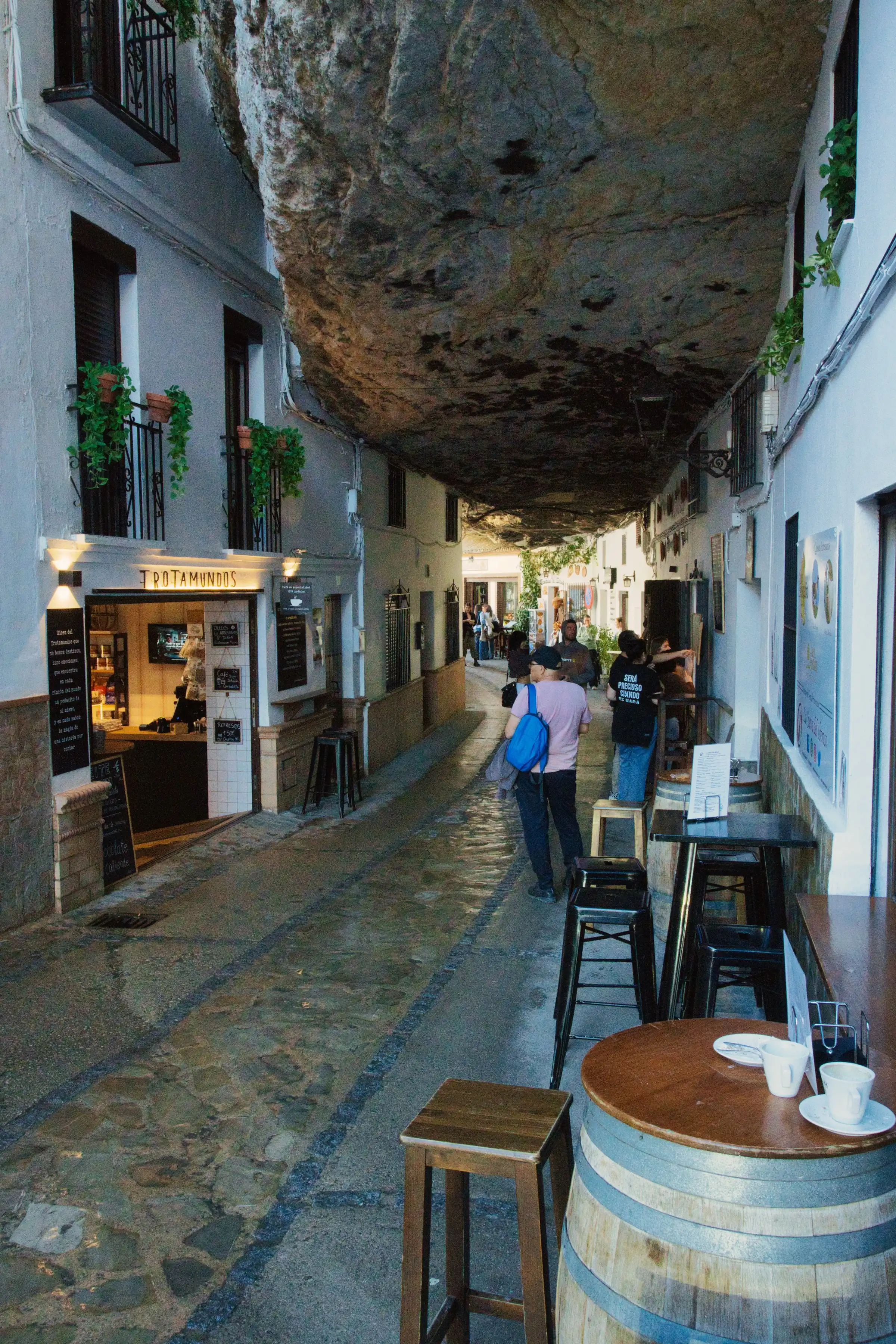 A cave with restaurants under it.